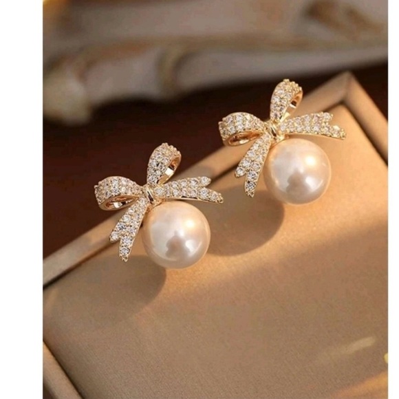 Anthropologie Jewelry - Anthropologie Kari Pearl and Bow Gold Rhinestone Classy Earrings